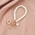 LV PEARL BAG CHARM